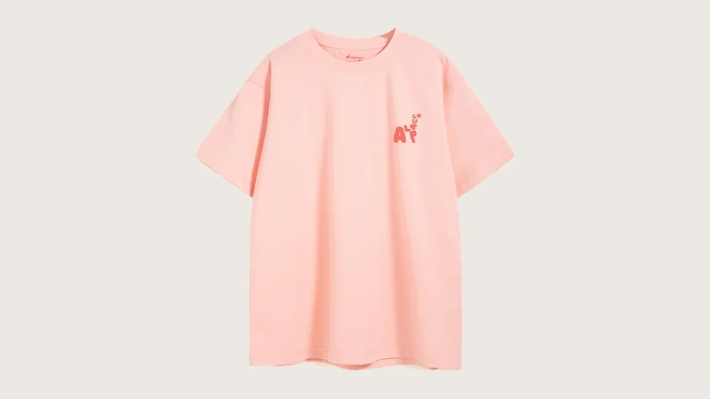 How to check t shirt quality: Alpacco 260gsm oversized graphic tee in Light Pink, front with small alpaca logo