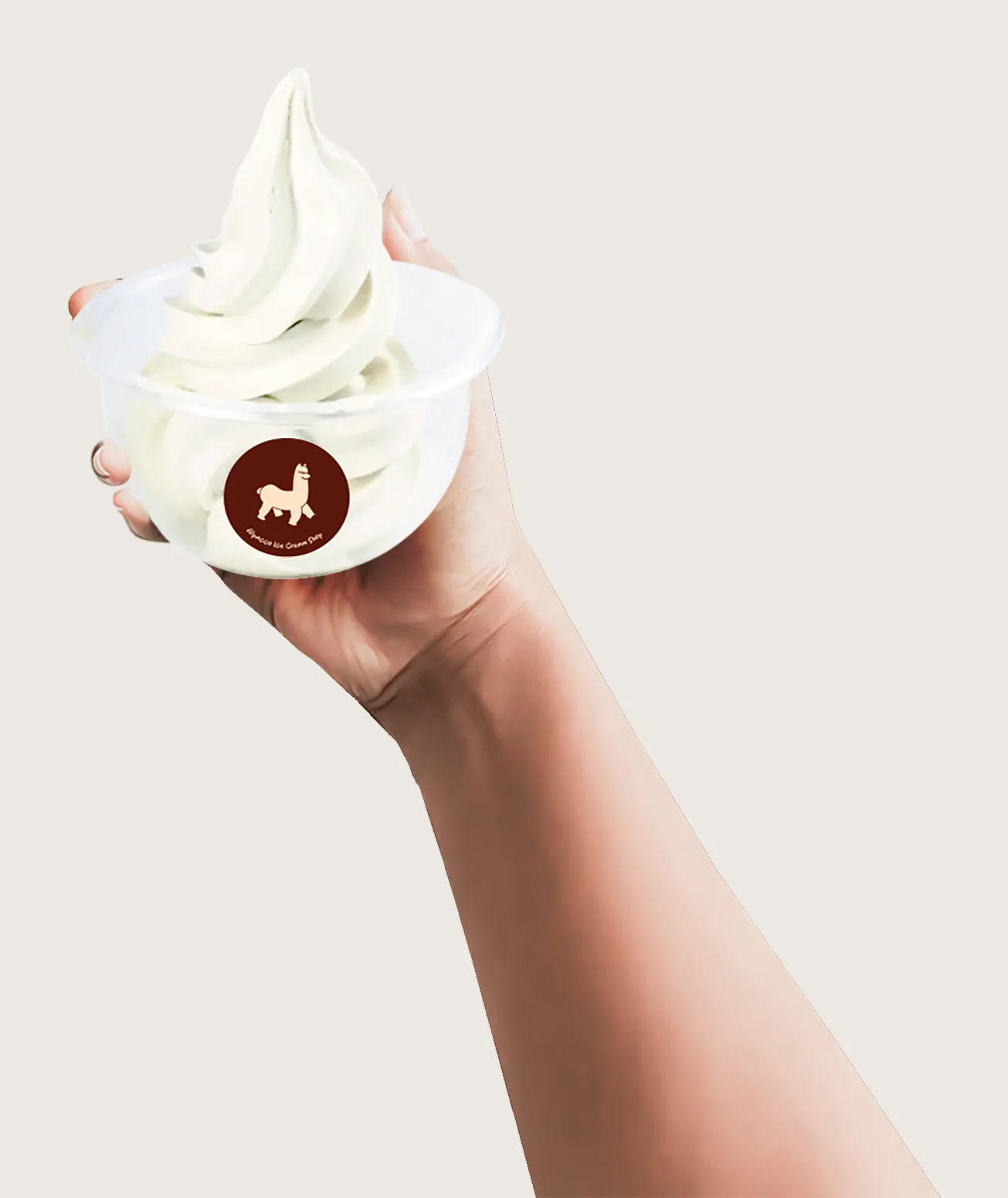 Milk soft serve klang: hand holding up an Alpacco cup of milk soft serve