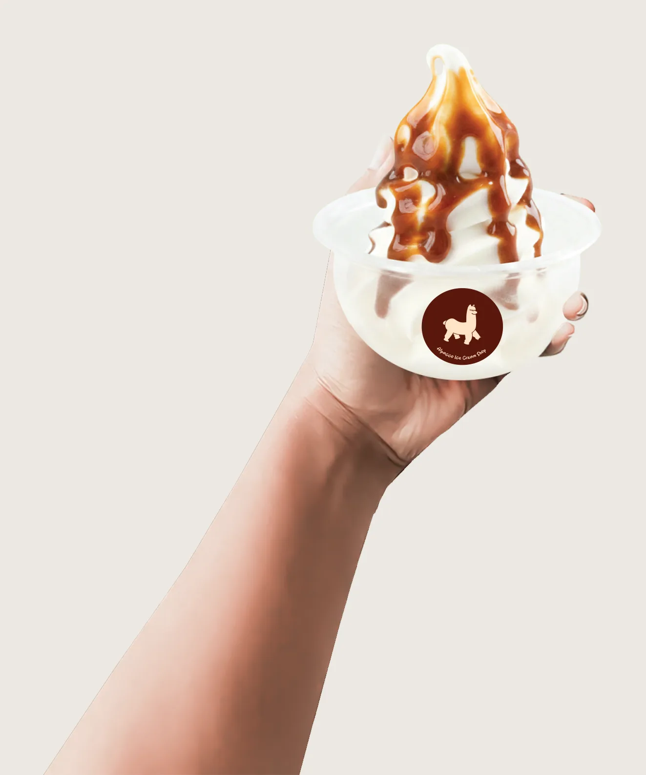Gula melaka ice cream malaysia: hand holding up an Alpacco cup of soya soft serve with brown syrup drizzle