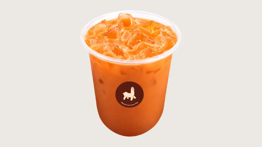 Thai milk tea klang: Alpacco iced Thai milk tea in a branded cup
