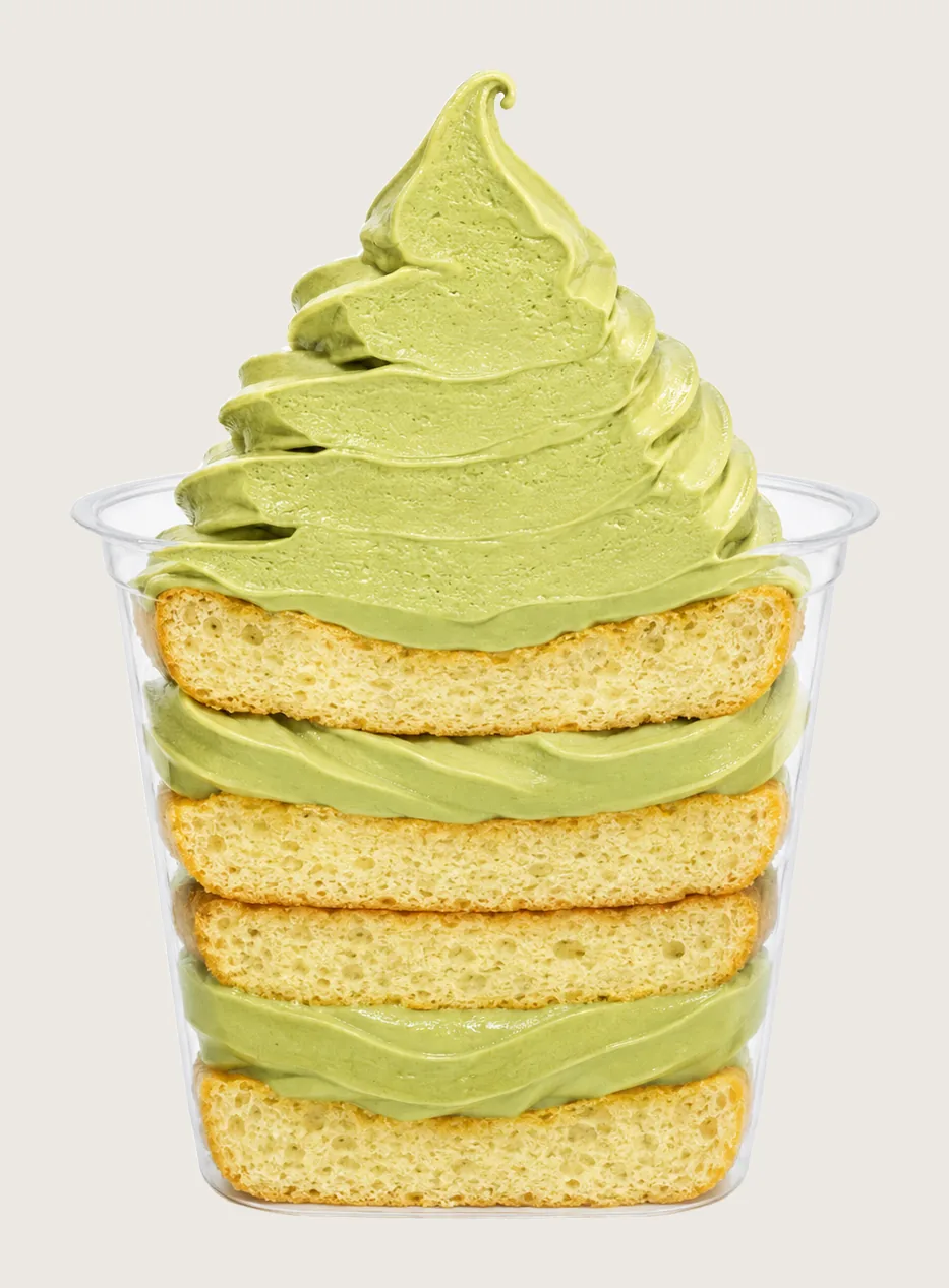 Pistachio soft serve: large Alpacco pistachio soft serve dessert with layered sponge cake