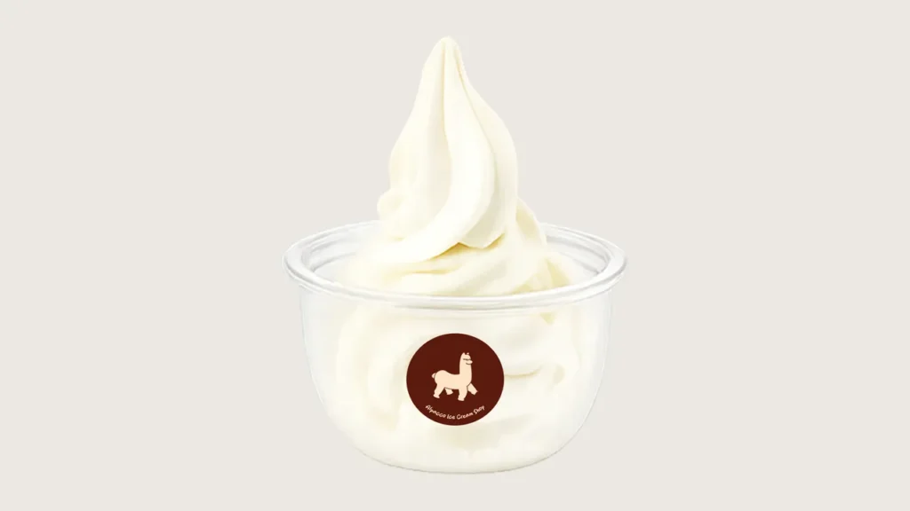 Soft serve vs ice cream: Alpacco milk soft serve swirl in a branded cup