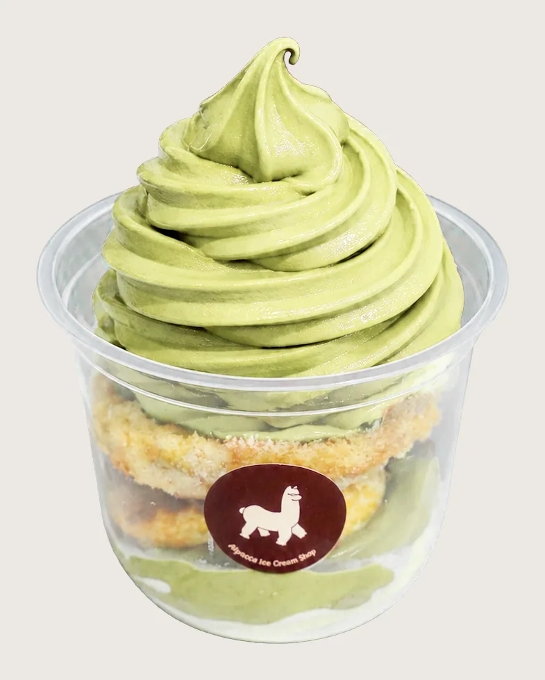 Celebration dessert klang: Alpacco pistachio soft serve on a layered cake dessert cup