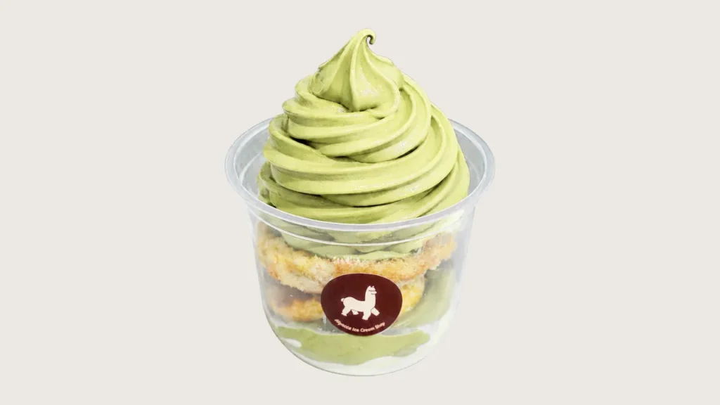 Soft serve flavours: Alpacco pistachio soft serve on a layered cake dessert cup