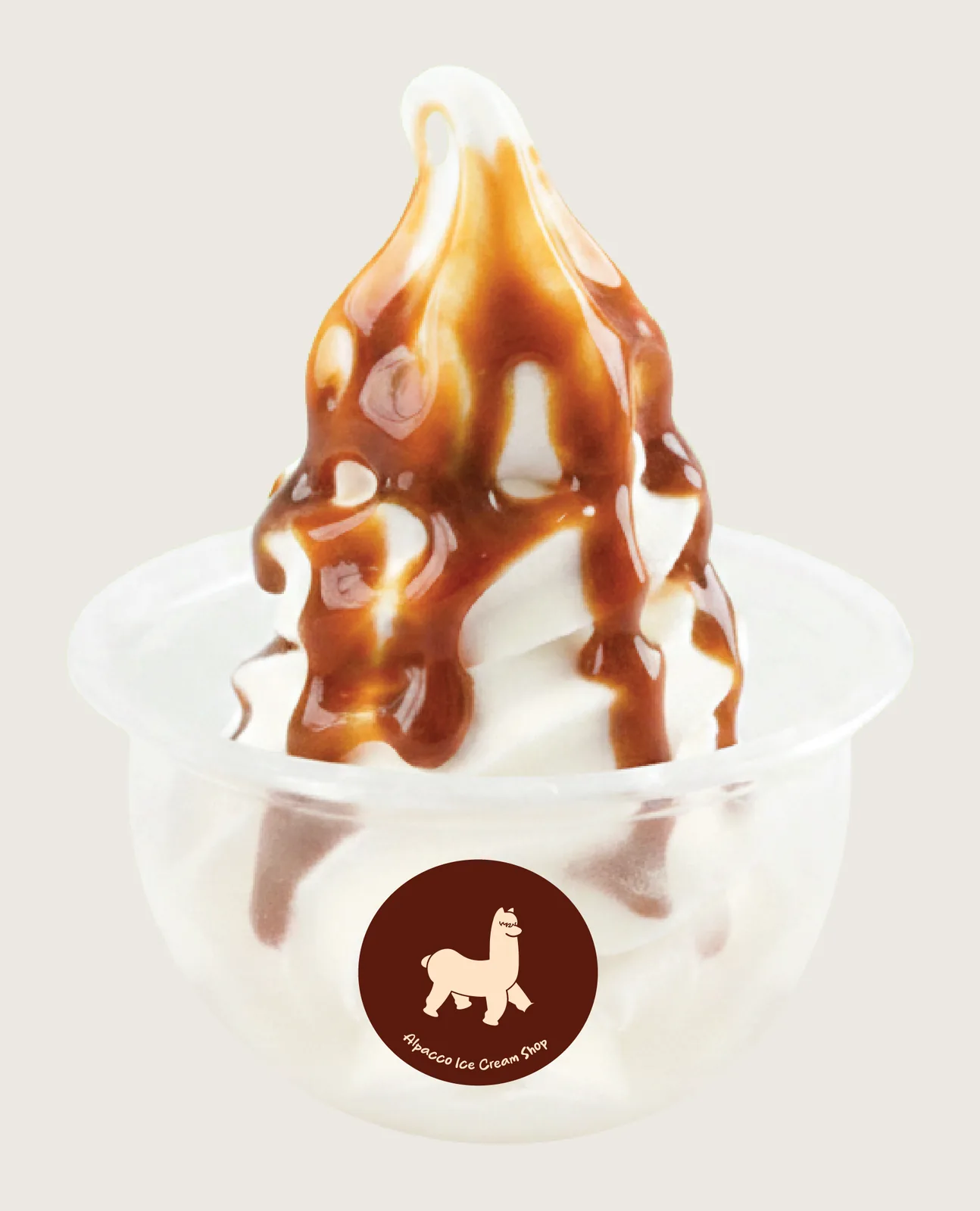 Dessert near me klang: Alpacco soya soft serve swirl in a cup with brown syrup drizzle