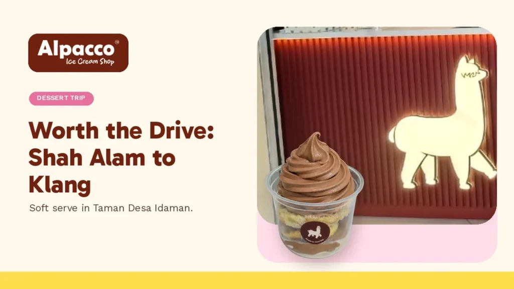 The glowing alpaca sign at Alpacco Ice Cream Shop with a chocolate soft serve cake dessert cup, a dessert trip near Shah Alam