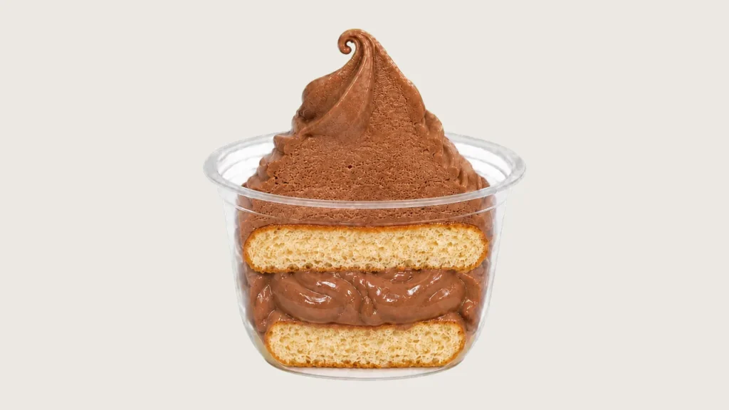 Halloween dessert ideas in Klang: Alpacco chocolate soft serve swirl over layered sponge cake in a clear dessert cup