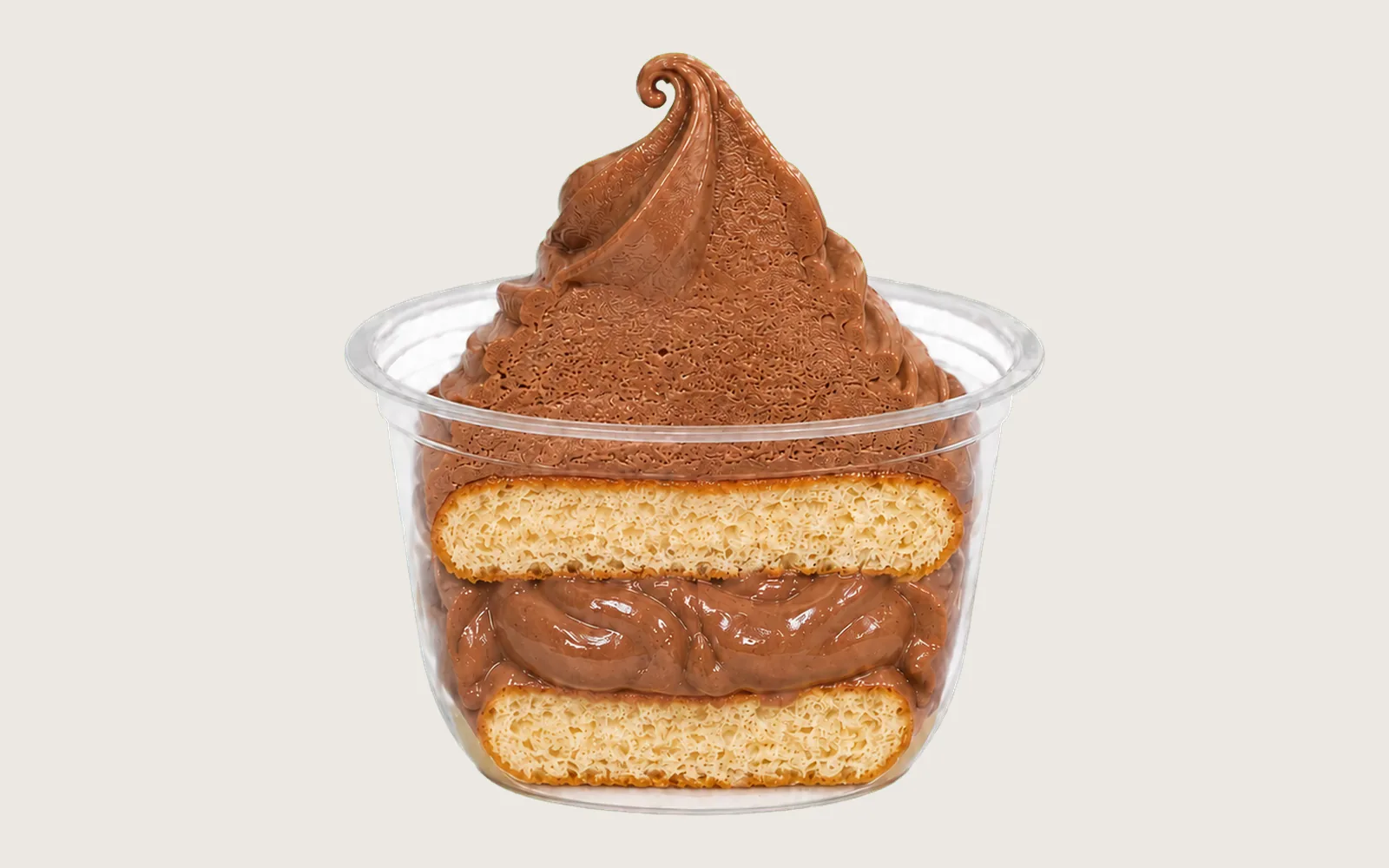 Hari raya dessert inspiration: cross-section of an Alpacco cup with chocolate soft serve over sponge cake layers