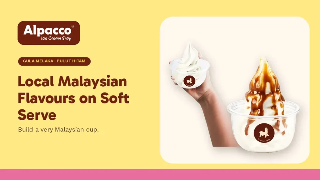 A hand holding Alpacco milk soft serve beside a soya soft serve cup, bases for Malaysian flavour ice cream toppings